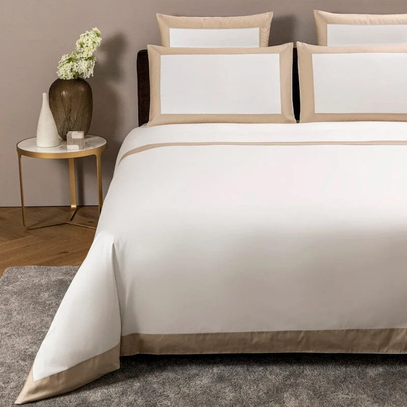 Bold Bedding in Milk and Savage Beige by Frette