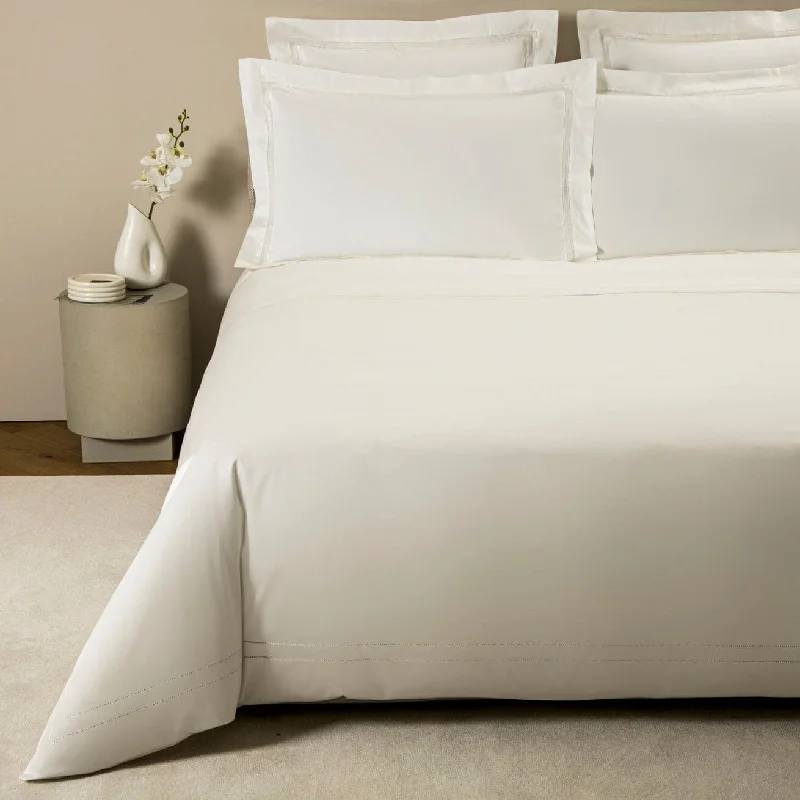 Doppio Ajour Milk Bedding by Frette